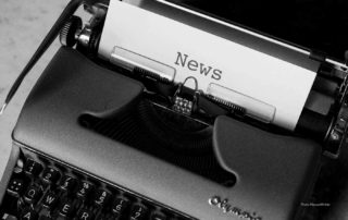 Typewriter with “News” typed on the paper